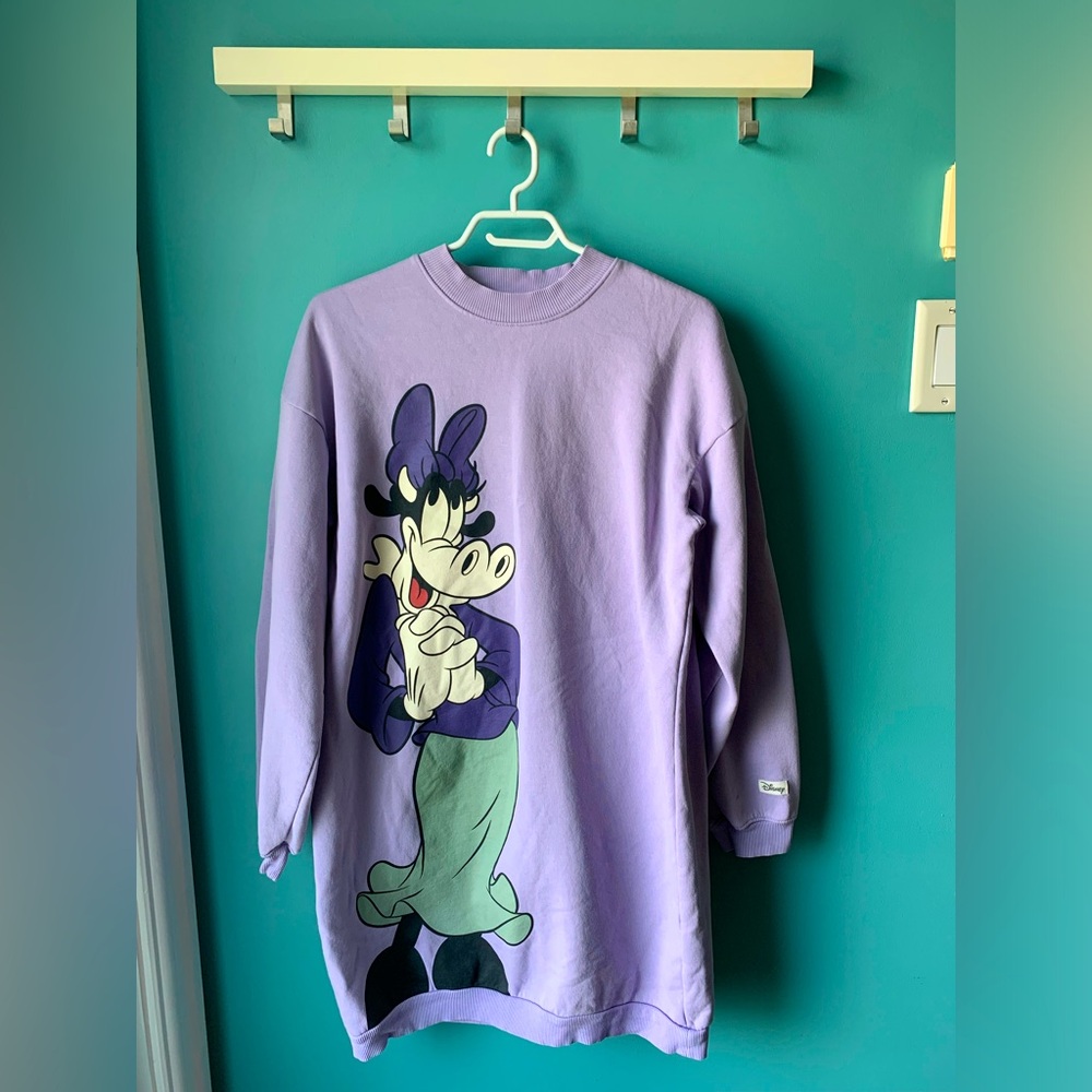 long purple shirt used as a night dress with Disney character printed